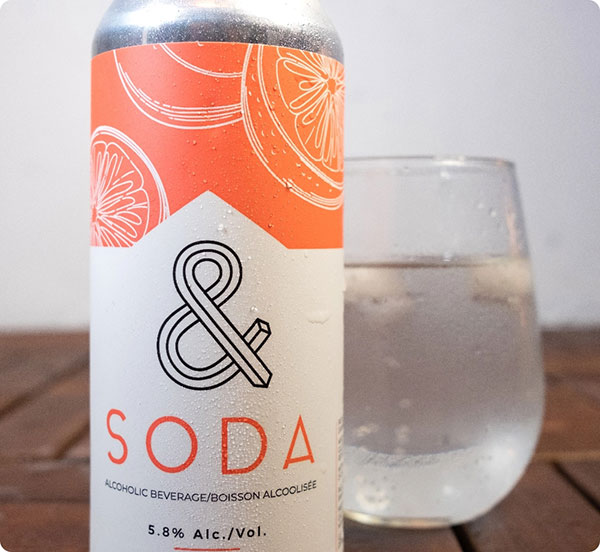 Grapefruit soda with glass of water